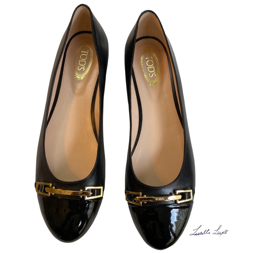 The Dean: New TODS leather gold embellished flat
